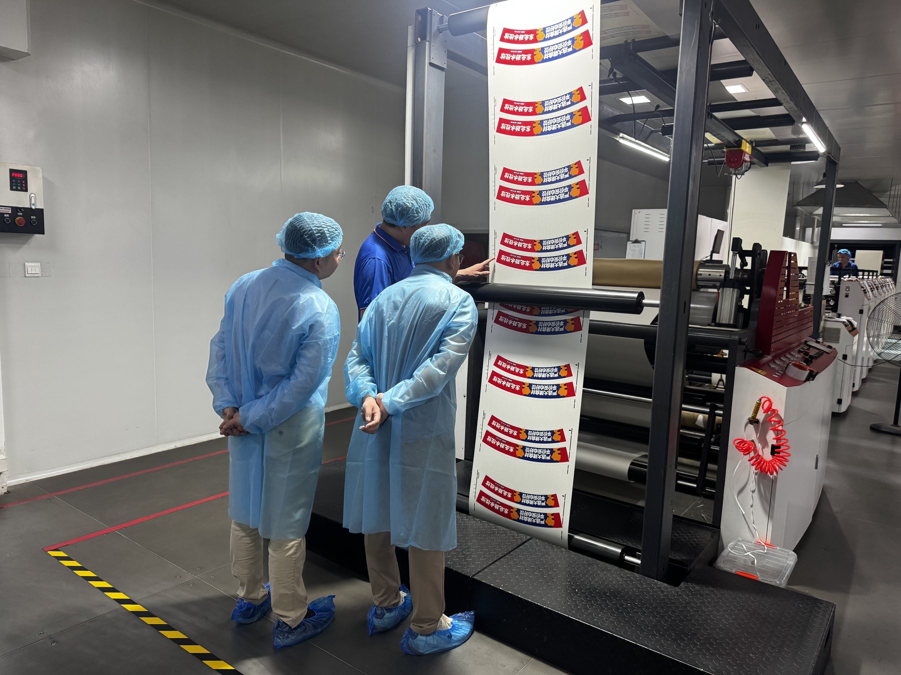 Inspection of custom printed paper cup material in the factory